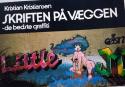 Billede af bogen Skriften på væggen Billede af bogen Skriften på væggen