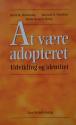 Billede af bogen At være adopteret - Udvikling og identitet