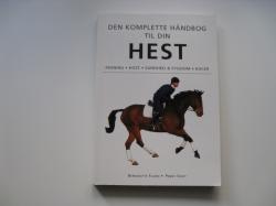 Billede af bogen Den komplette håndbog til din hest.
