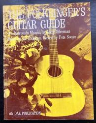 Billede af bogen The folksingers guitar guide