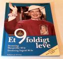 Billede af bogen Et nifoldigt leve i anledning af Dronning Margrethe 50 år, Dronning Ingrid 80 år