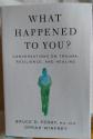 Billede af bogen What happened to you? Conversations on trauma...