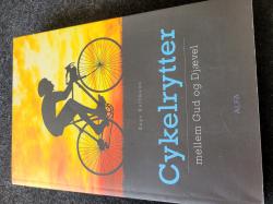 Billede af bogen Cykelrytter - mellem Gud og Djævel