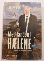 Billede af bogen Med fanden i hælene