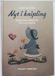 Billede af bogen Nyt i knipling - Begynderknipling for børn og voksne.