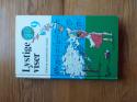 Billede af bogen Lystige viser 9 - tekster, noder, becifringer Billede af bogen Lystige viser 9 - tekster, noder, becifringer