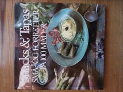 Billede af bogen Snacks & tapas - små- og forretter på 100 måder Billede af bogen Snacks & tapas - små- og forretter på 100 måder