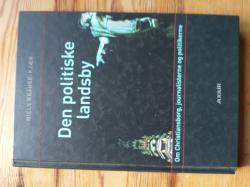 Billede af bogen Den politiske landsby Billede af bogen Den politiske landsby