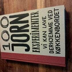 Billede af bogen 100 Jorn-eksperimenter vi kan lave derhjemme ved køkkenbordet