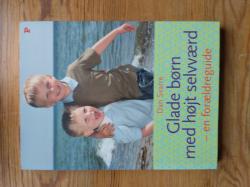 Billede af bogen Glade børn med højt selvværd - en forældreguide