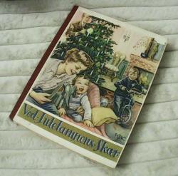 Billede af bogen Ved julelampens skær - 1957