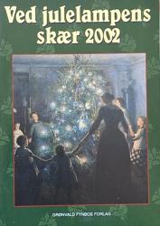 Billede af bogen Ved julelampens skær 2002