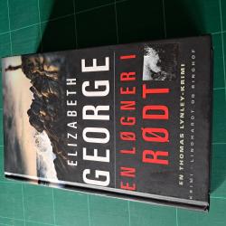 Billede af bogen En løgner i rødt Billede af bogen En løgner i rødt